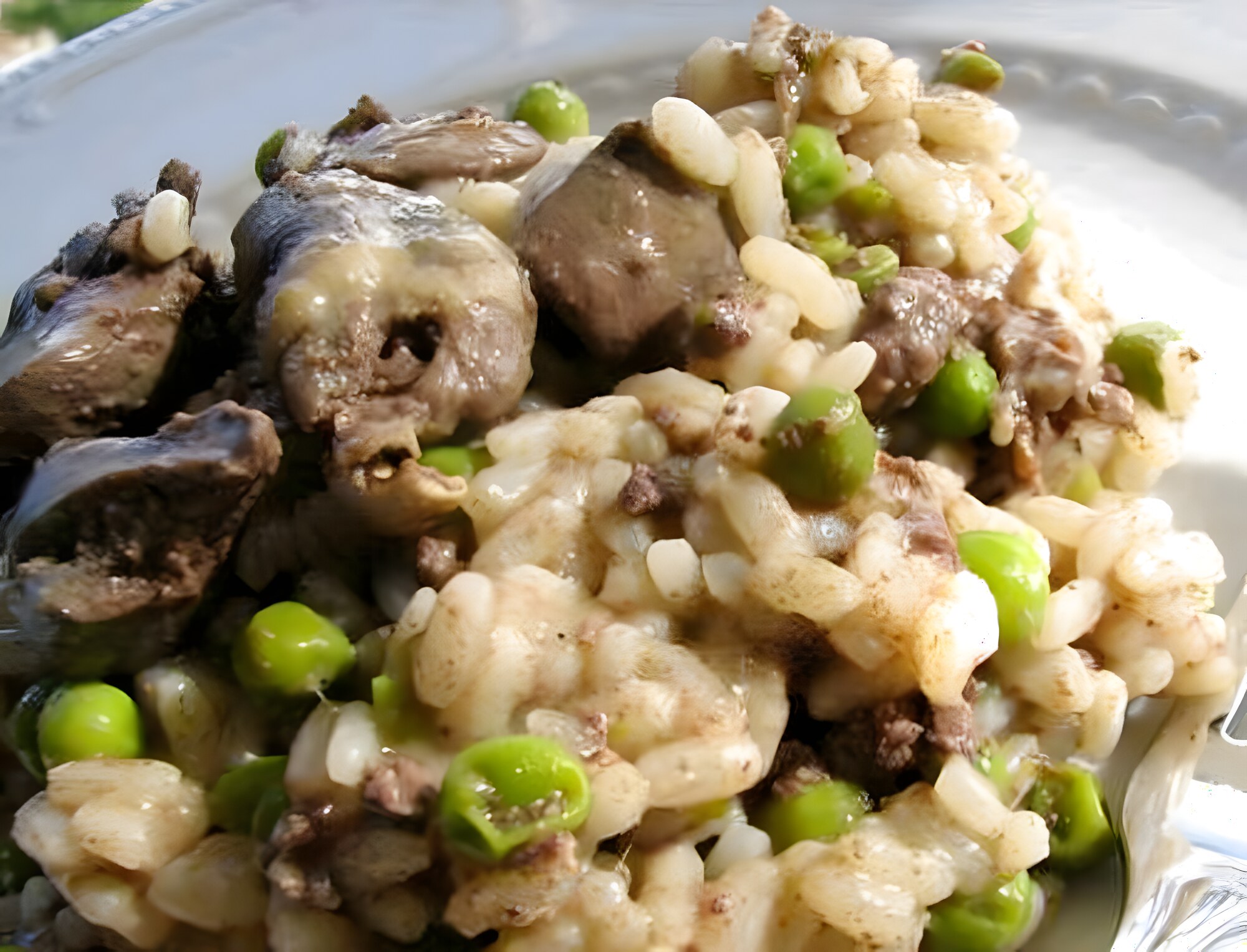 Risotto con fegatini di pollo e piselli